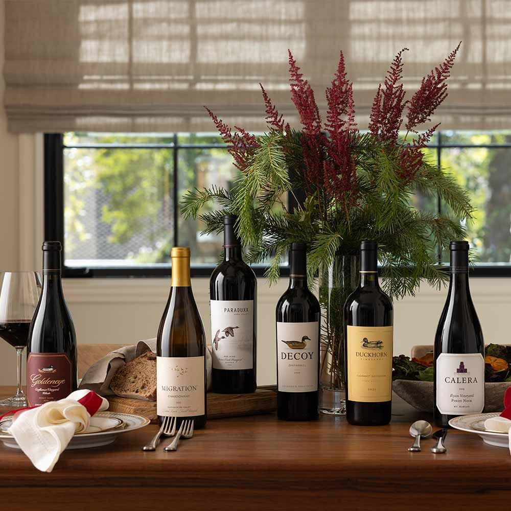 Setting up dining table with wines from The Duckhorn Portfolio