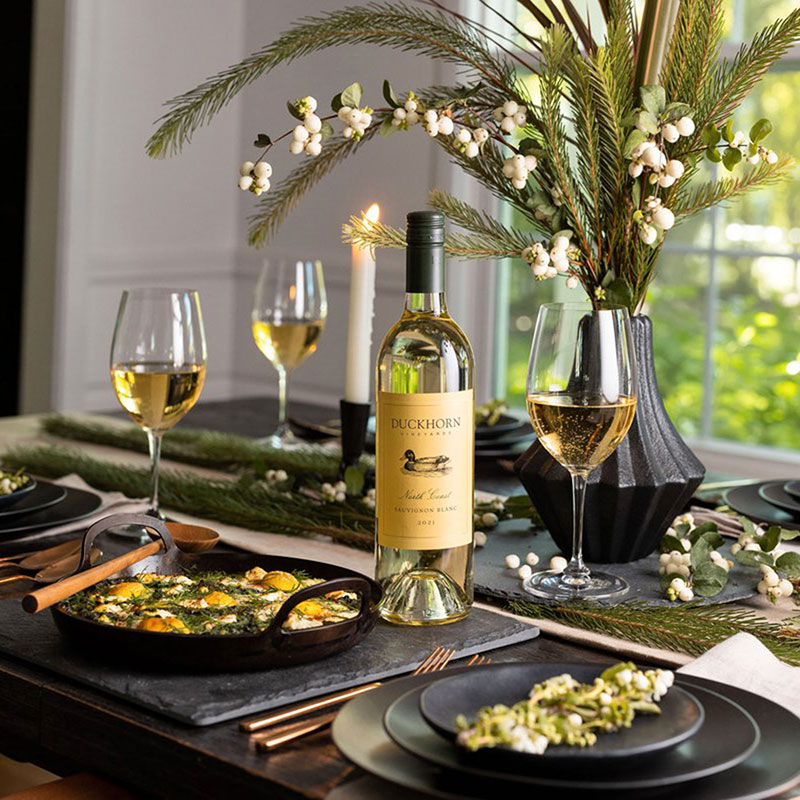 Food and wine on Christmas brunch table