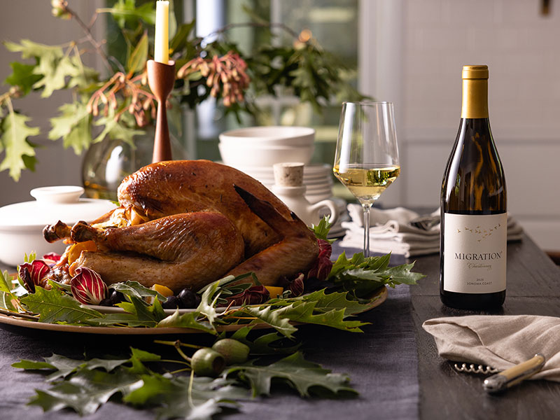 Turkey on thanksgiving table with white wine