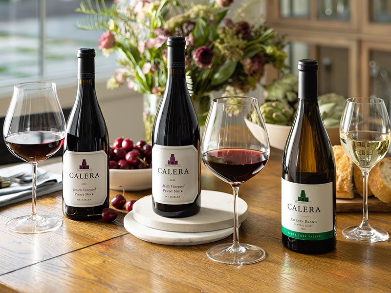 Calera wines on a table with a cheese plate