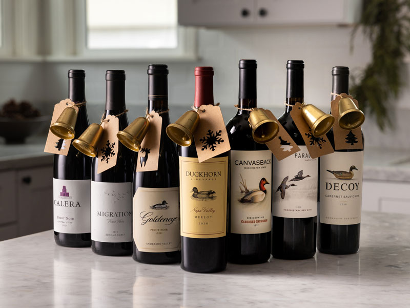 Duckhorn Vineyard wines on a counter with gift tags