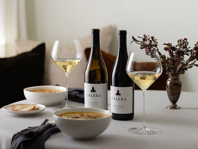 Calera wines on a table with a soup