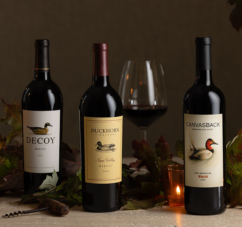 Duckhorn Portfolio merlot on a fall table