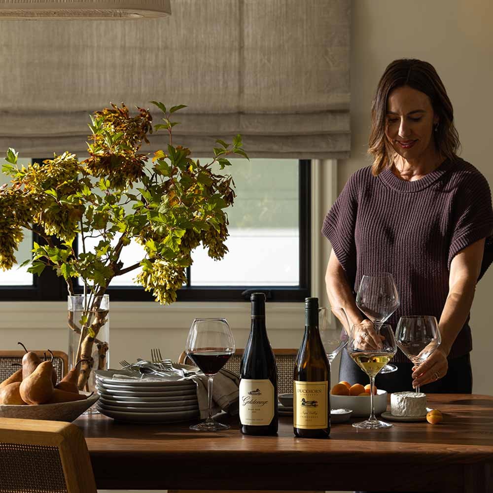 Setting up dining table with wines from The Duckhorn Portfolio