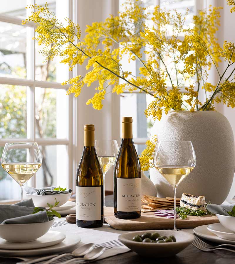 Migration wines with plates and wine glasses