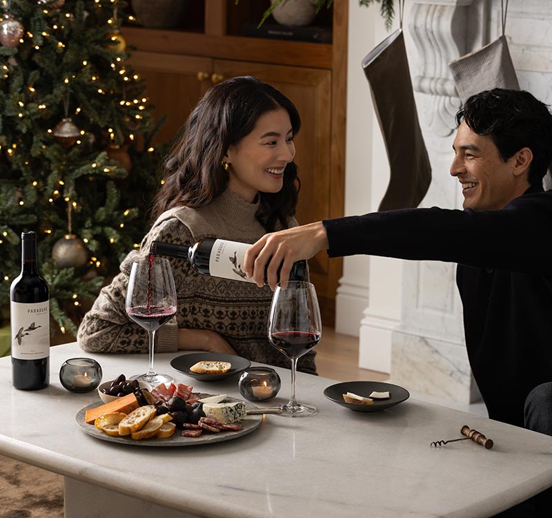 A couple pouring Paraduxx wines