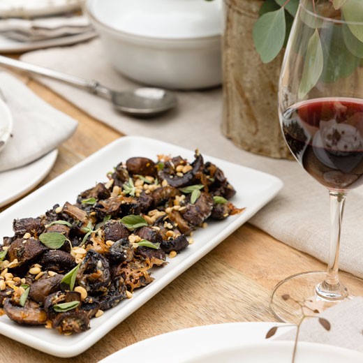 Garlic and Parmesan Roasted Crimini Mushrooms with Pine Nuts and Oregano